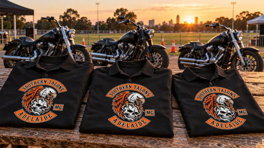 Southern Talons Adelaide motorcycle club polo shirts prepared beside parked V-twin motorcycles for a public safety event arrival.