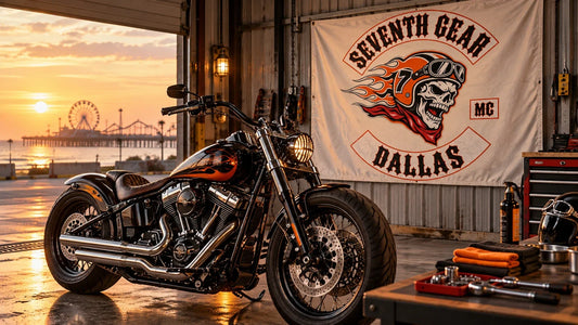 Seventh Gear Dallas custom-bike show preparation bay with a logo banner, inspection tools and an unbranded V-twin motorcycle.