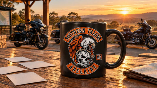 Southern Talons Adelaide logo mug beside a Mount Barker motorcycle club AGM handover plan and parked V-twin motorcycles