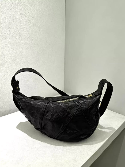 asymmetric vegetable-tanned horsehide bag 1