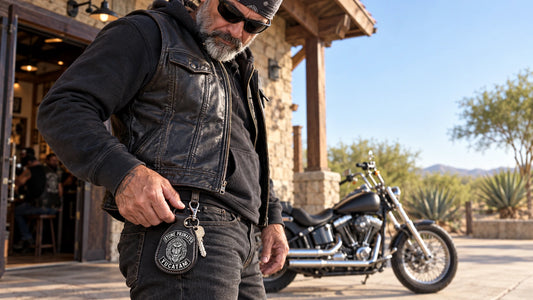 Motorcycle club member using a custom leather key fob with an authorized club logo at a clubhouse entrance.