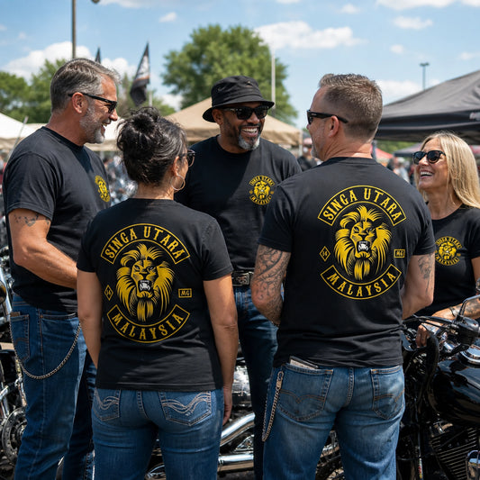 Singa Utara motorcycle club riders wearing matching short-sleeve T-shirts at a summer rally.