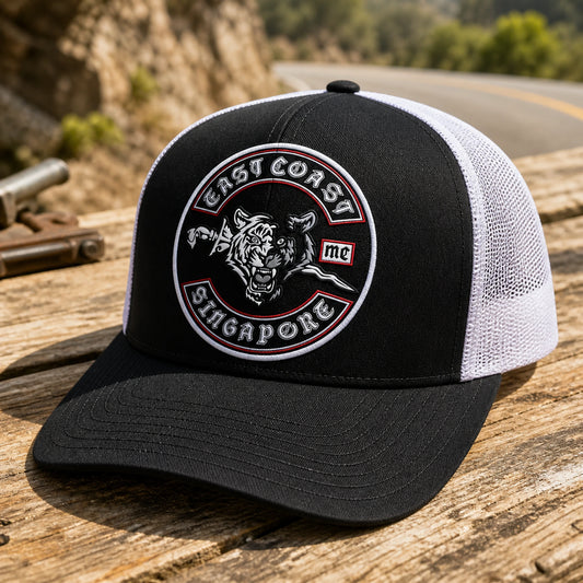 Mesh-back motorcycle club trucker cap with an authorized club logo for warm-weather riding.