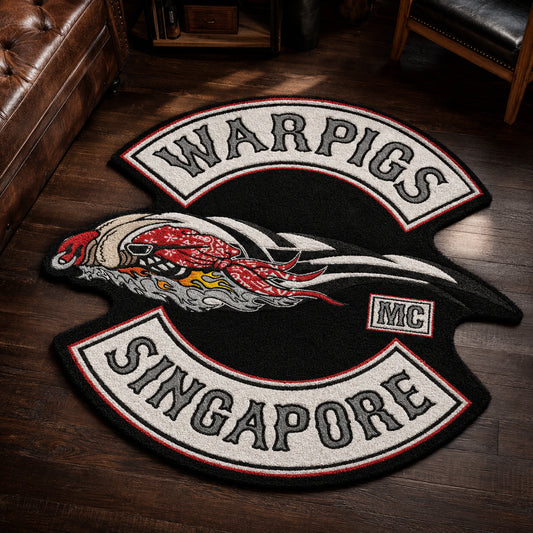 A thick tufted motorcycle club rug shows dimensional pile and bold club artwork.