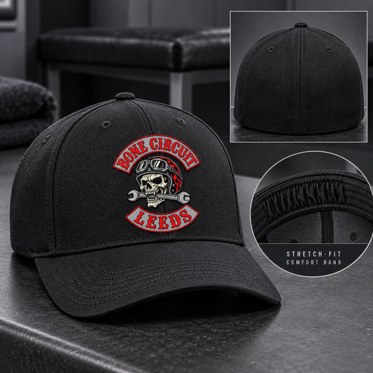 Flexible motorcycle club stretch-fit cap with a closed back and visible elastic comfort band.