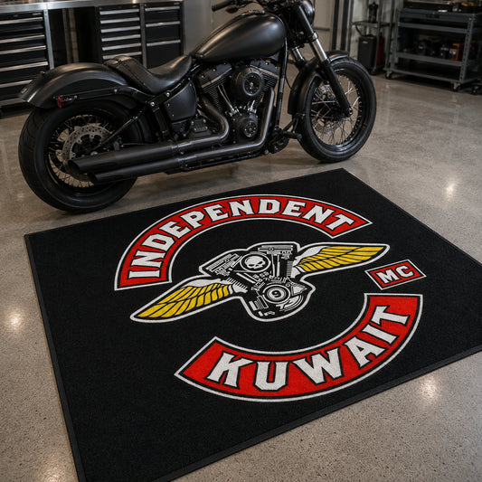 A custom motorcycle garage mat sits beside an American V-twin motorcycle.