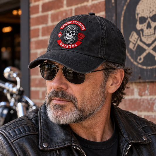 Side view of a rider wearing a low-profile motorcycle club cap with an authorized club emblem.