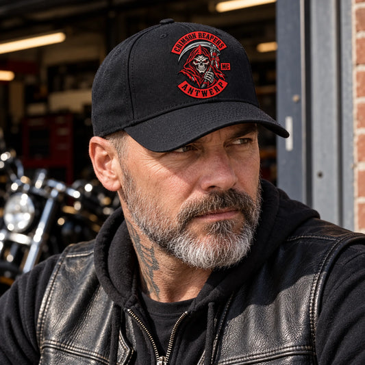 Rider wearing a balanced mid-profile motorcycle club cap with authorized logo embroidery.