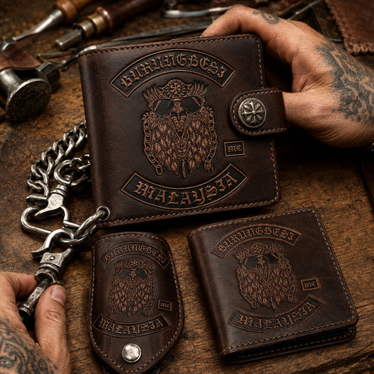 Vegetable-tanned motorcycle club wallet with an authorized logo translated into deep traditional leather tooling.