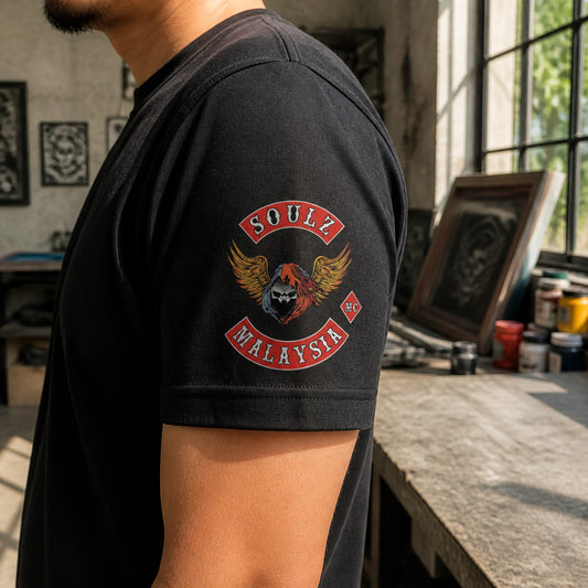 Compact Soulz MC Malaysia club detail printed on a short T-shirt sleeve.