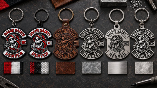 Motorcycle club keychain material samples showing embroidered fabric, leather, metal, stainless steel and sterling silver constructions.