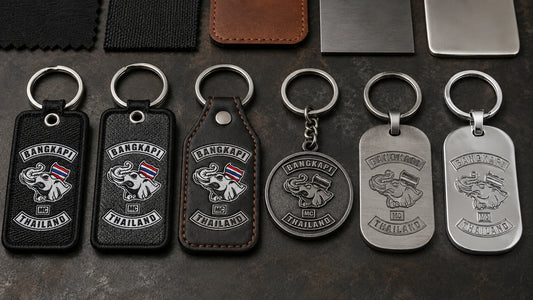 Motorcycle club keychain material samples showing embroidered fabric, leather, metal, stainless steel and sterling silver constructions.