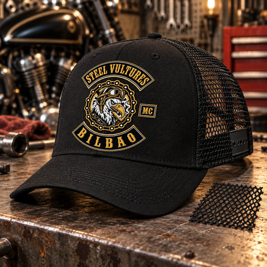 Steel Vultures motorcycle club logo embroidered on a black trucker cap with clearly visible breathable mesh rear panels.
