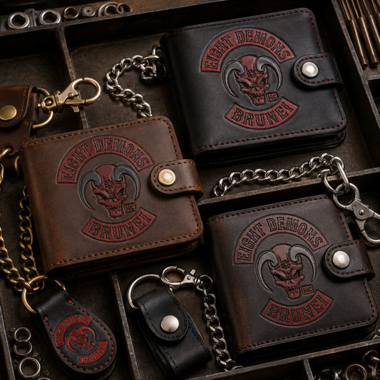 Motorcycle club wallet with an authorized logo shown beside brass, nickel and gunmetal hardware finish options.