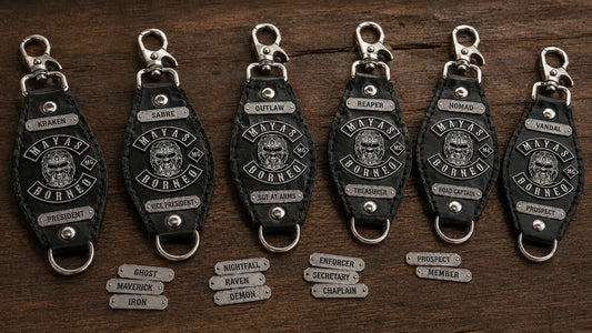 Personalized motorcycle club keychains sharing one authorized logo with different member names and positions.