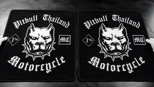 Printed motorcycle club rugs reproduce fine logo details on a low-pile surface.