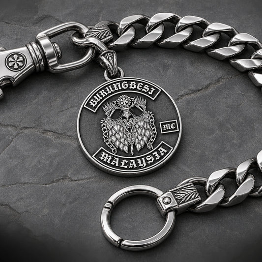 Stainless steel chain character featuring an authorized motorcycle club logo.