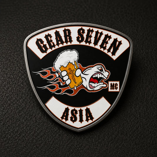 Butterfly metal clutch on a motorcycle club enamel pin; non-circular rounded road shield shape with a solid one-piece metal backplate.