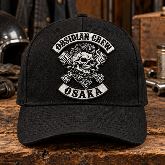 Traditional embroidered motorcycle club patch attached to a custom black baseball cap.