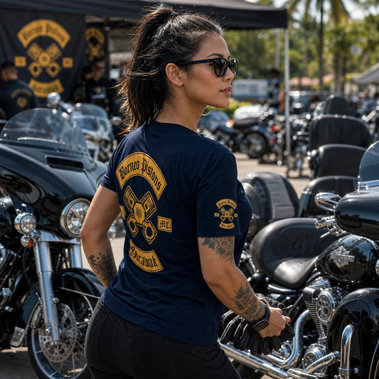Borneo Pistons MC rider wearing a lightweight navy cotton-blend short-sleeve club T-shirt at a warm-weather motorcycle rally.