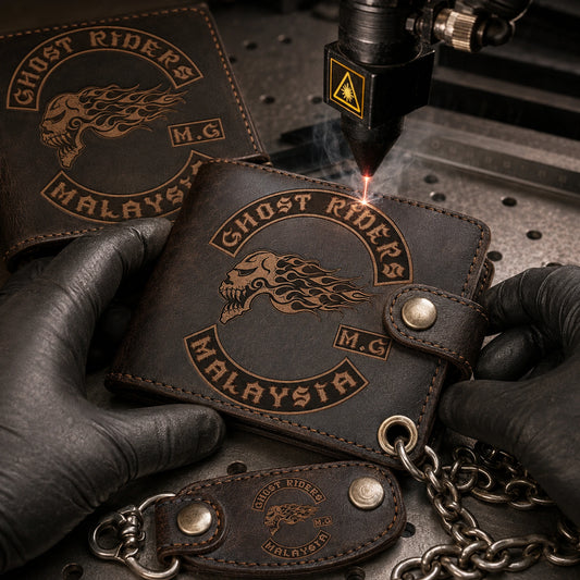 Custom leather club wallet with an authorized motorcycle club logo being precisely laser engraved.