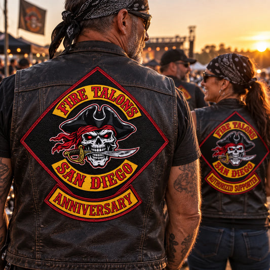 Rally volunteers wearing coordinated fictional anniversary and support diamond patches for a motorcycle club.