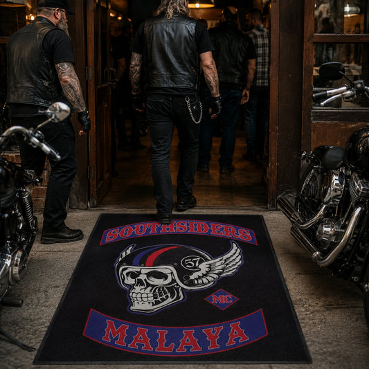 Motorcycle club members step across a custom clubhouse entrance rug.