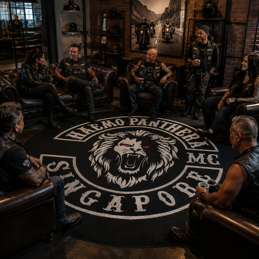 Members gather around a large custom motorcycle club lounge rug.