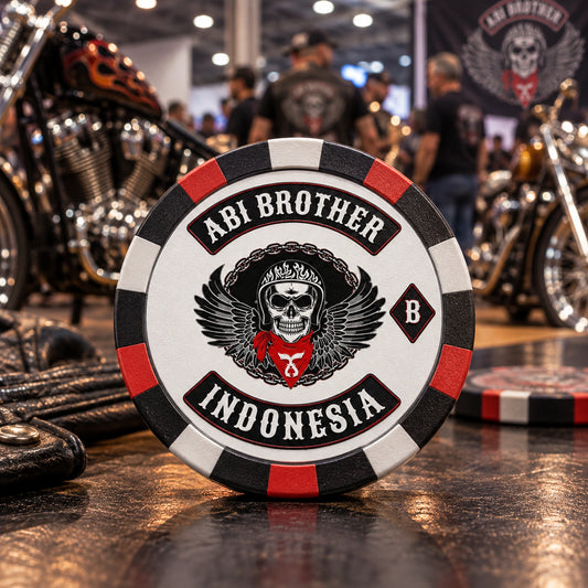 Solid collectible poker chip displayed at a custom motorcycle event.