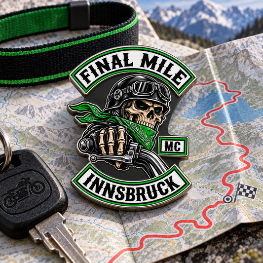 Final Mile Innsbruck motorcycle club run pin displayed with a folded route map and rally wristband.