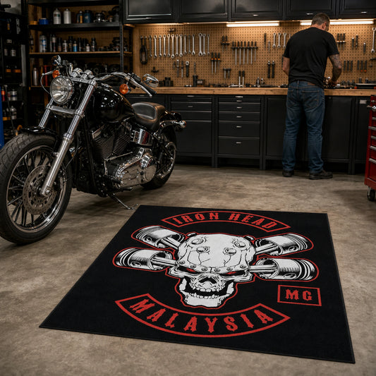 A custom motorcycle club rug brings chapter identity into a working garage.