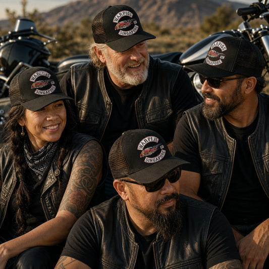 Motorcycle club rally crew wearing custom mesh-back caps with an authorized club logo.