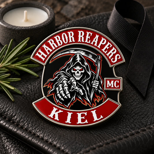 Harbor Reapers Kiel memorial enamel pin arranged respectfully with a black remembrance ribbon and candle.