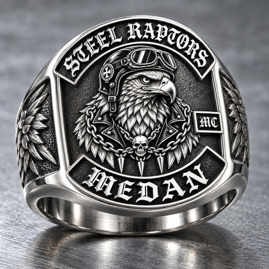Custom Steel Raptors motorcycle club ring in polished 316L stainless steel with dark recessed details.