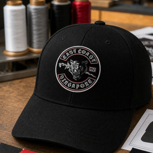 Motorcycle club cap sample with authorized logo, embroidery threads and placement options for approval.