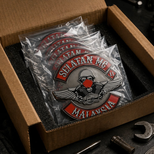 Inspected motorcycle club pins packed for worldwide shipping.