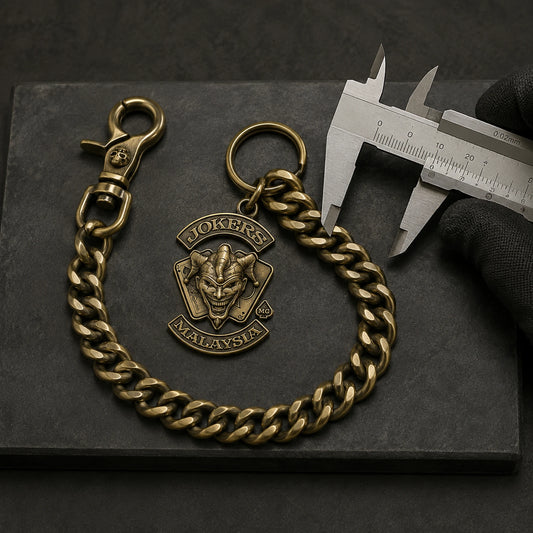 Finished chain inspection before shipping featuring an authorized motorcycle club logo.
