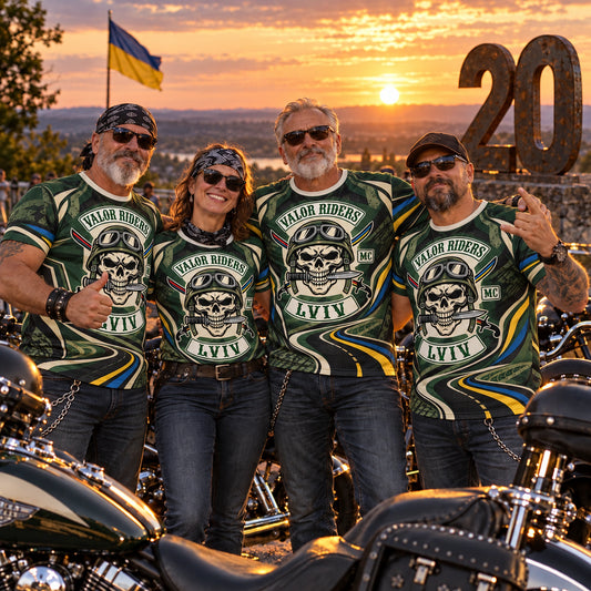 Valor Riders Lviv motorcycle club members wearing full-coverage commemorative performance shirts after an anniversary run.