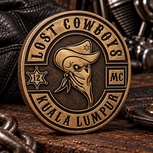Antique bronze motorcycle club challenge coin with aged relief.