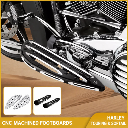 Arlen Ness CNC-machined footboards installed on a Harley Touring motorcycle with matching control parts