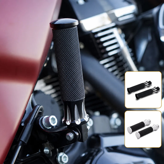 Arlen Ness Fusion black motorcycle foot peg installed on a Harley-Davidson