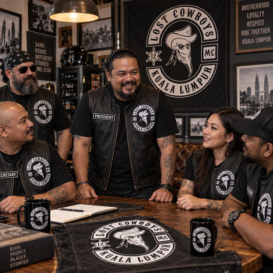 Motorcycle club officers wearing coordinated rank patches during a chapter meeting.