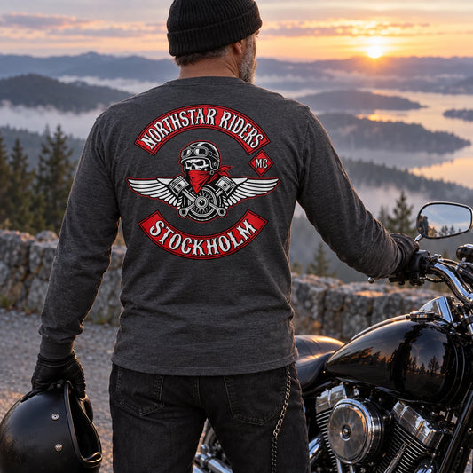 Motorcycle club rider wearing a custom long-sleeve shirt during a cool early-morning ride.