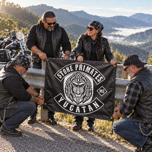 Club members arranging a custom logo banner outside their motorcycle clubhouse.