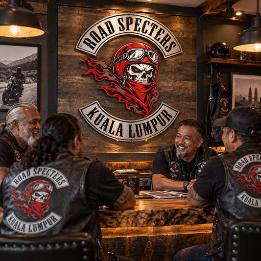 Motorcycle club metal sign used as the main visual centerpiece in a clubhouse gathering room.