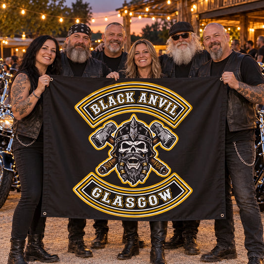 Adult motorcycle club members celebrate an anniversary while holding a complete custom event flag.