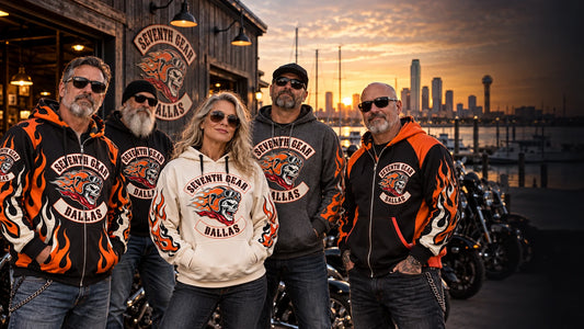 International motorcycle club chapter wearing coordinated custom all-over print hoodies outside a harbor-side clubhouse.