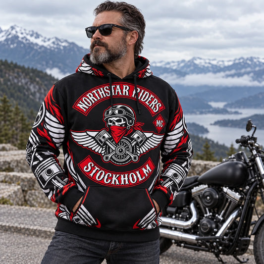 Mature rider wearing a custom motorcycle club pullover sublimation hoodie at a mountain turnout.