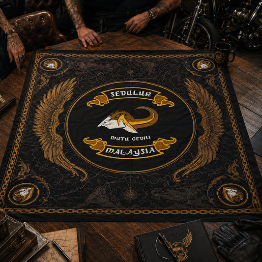 Custom motorcycle club bandana featuring the authorized Sedulur identity in large adult square bandana stretched flat across a clubhouse planning table, four corners fully visible.