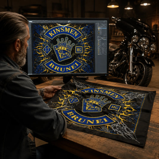 Custom motorcycle club bandana featuring the authorized KINSMEN MG identity in designer presenting a polished free custom bandana layout on a calibrated monitor beside the physical textile.